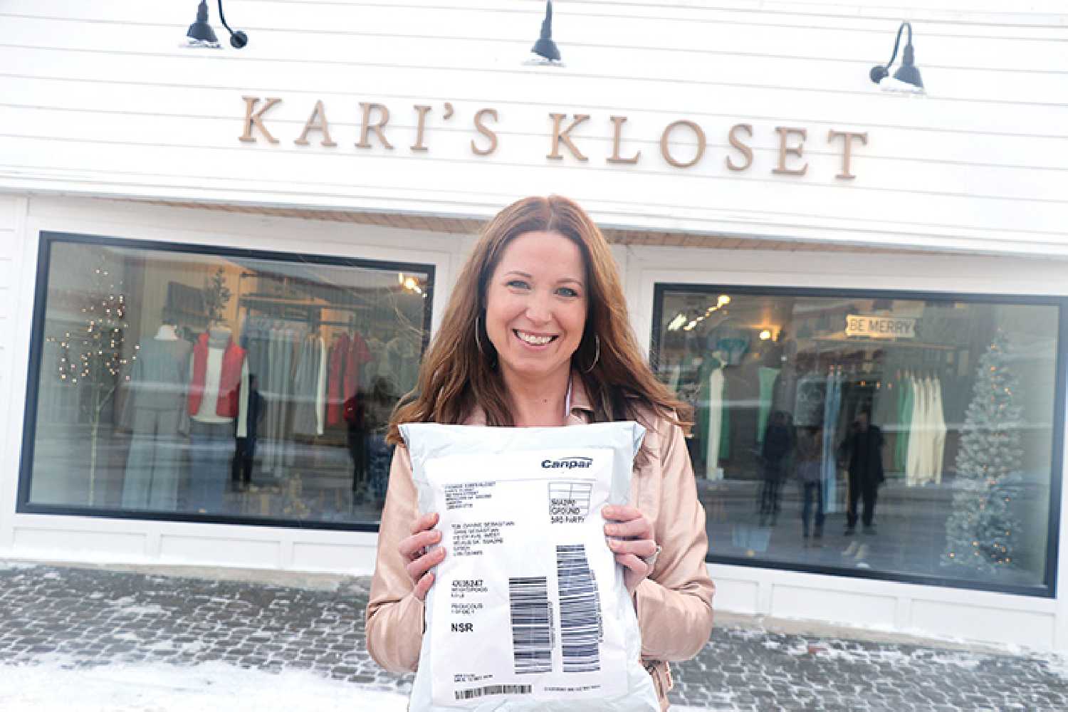 Kari Kosier has turned to an online shipping company to get her parcels out to customers since the Canada Post strike.